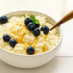 Blueberry cottage cheese breakfast bowl with honey