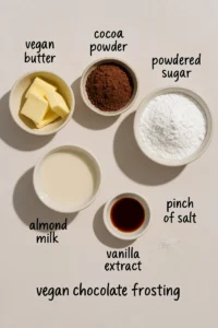 Vegan Chocolate Frosting Recipe That’s Creamy, Rich, and Foolproof 14 Vegan chocolate frosting ingredients on countertop