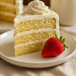 serving rosemary’s bakery whipped cream cake with berries