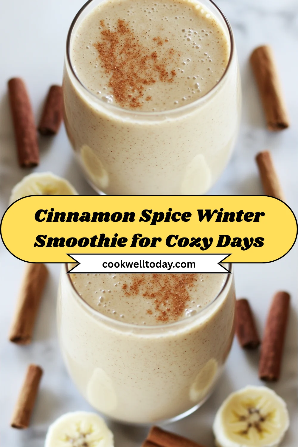 Cinnamon-Spice-Winter-Smoothie-for-Cozy-Days A creamy cinnamon spice winter smoothie in a glass, topped with a sprinkle of cinnamon.